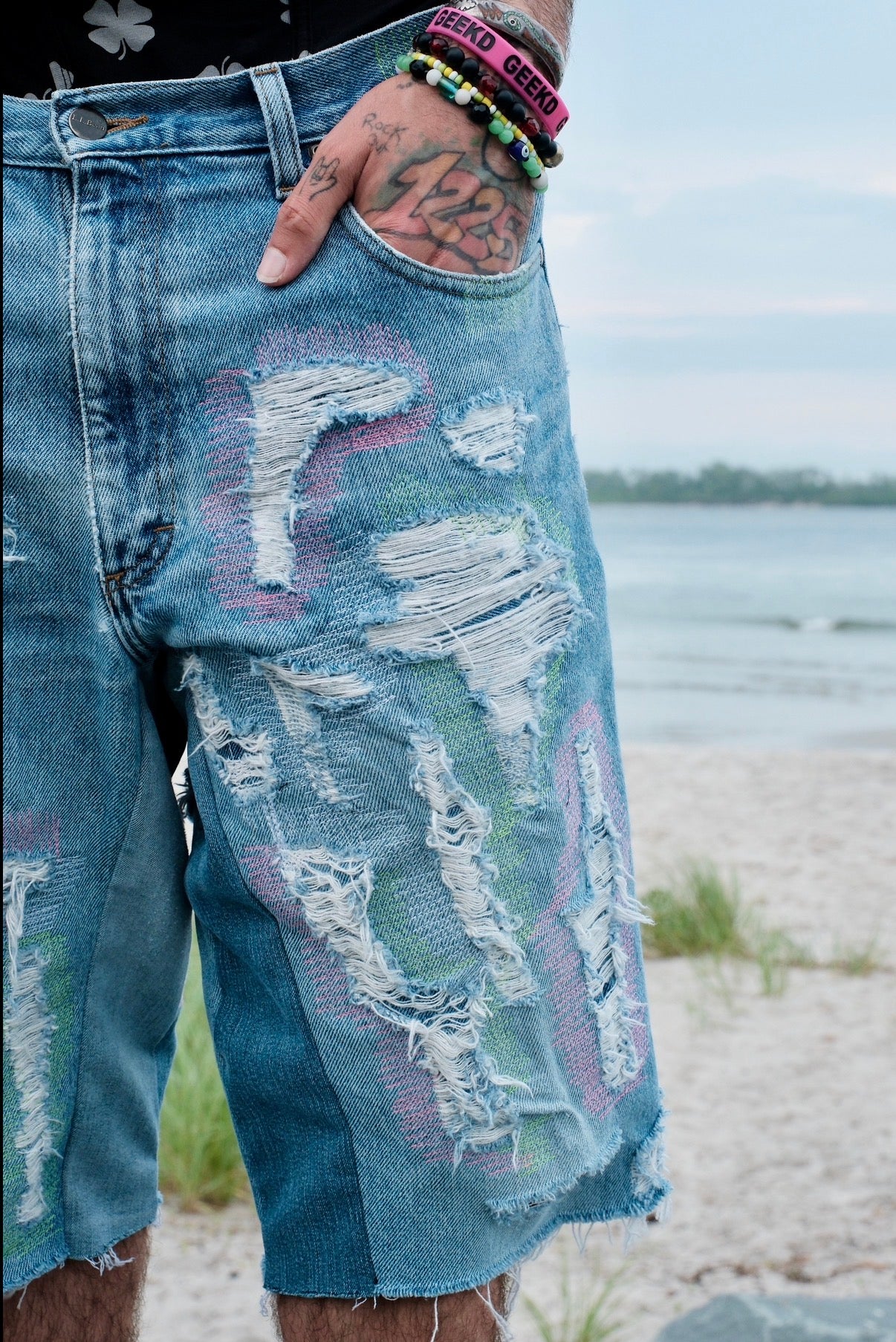 Repaired Flared Denim shorts Green/Pink Light wash